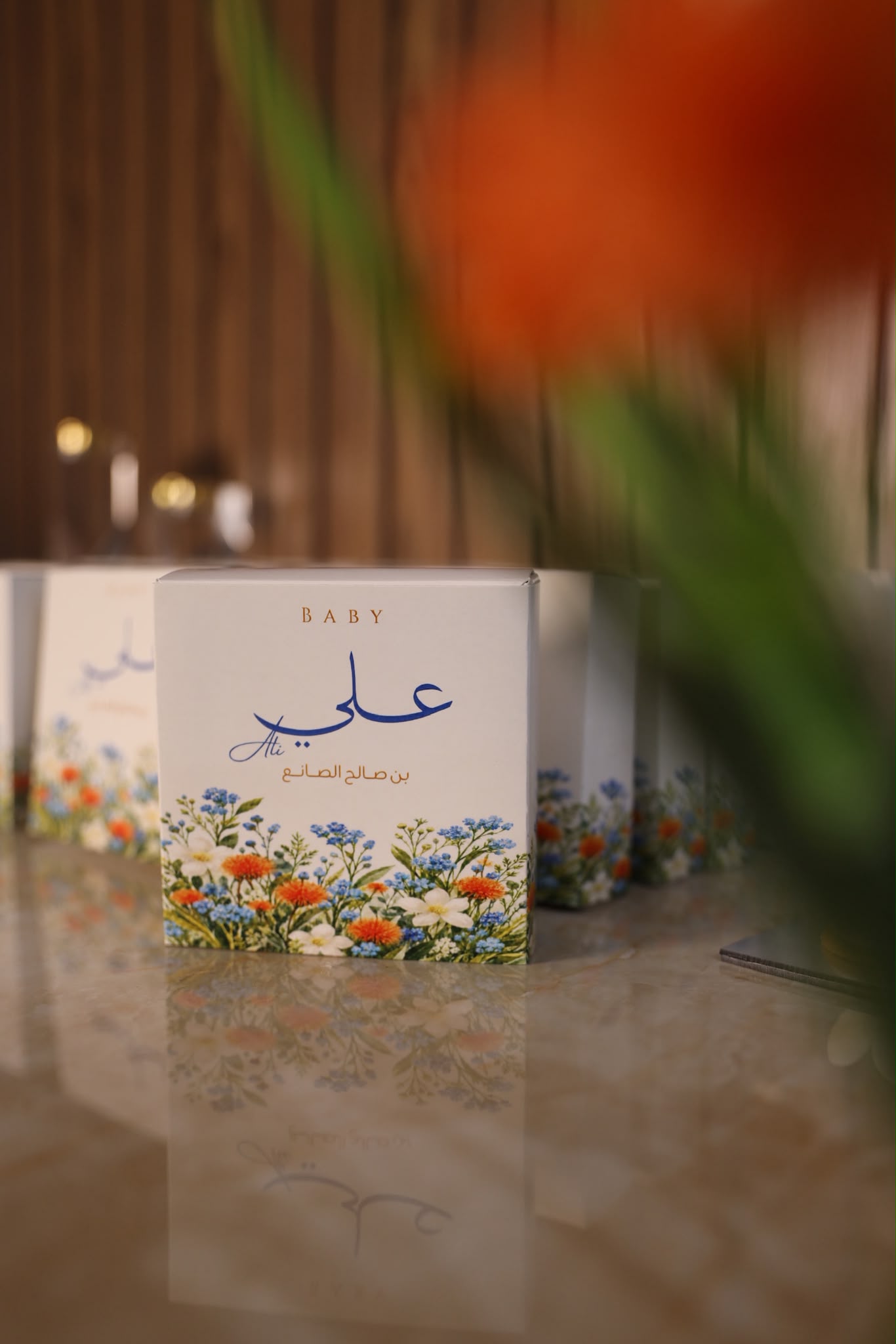 علب توزيعات باسم المولود علي